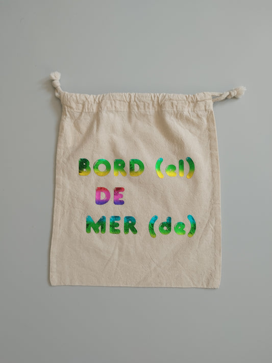 Pochette de plage - Bord(el) de mer(de) - Edition Arc en ciel